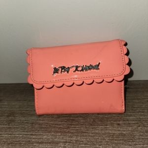 coral wallet with scalloped edges